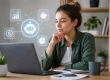 woman at laptop researching money AI decisions