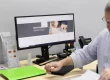 David working at his desk